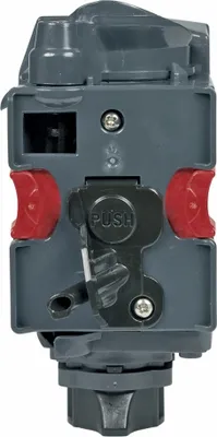 Close-up studio shot of a coffee machine brewing unit.