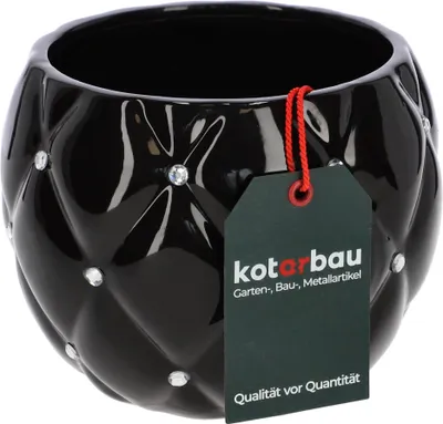 A black ceramic pot with diamond-shaped quilting and rhinestones, with a product tag attached.