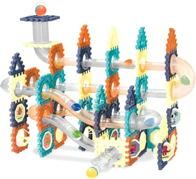 A colorful marble run toy set with transparent tubes and interlocking gears.