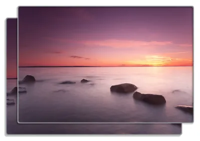 Produktbild von Wallario Frühstücksbrettchen 2er Set aus Glas, je 20 x 30 cm, mit rutschfesten Füßen, Motiv Nebel am See bei Sonnenuntergang