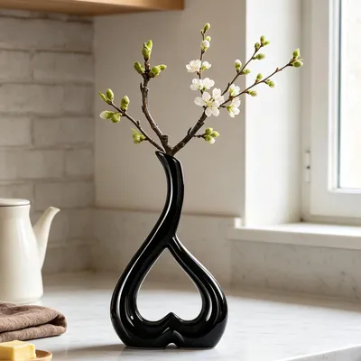 Produktbild von Schwarze, herzförmige Keramikvase – Moderne Boho-Dekoration