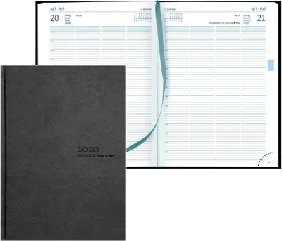 A black planner book is shown open, revealing its pages with a blue ribbon bookmark.