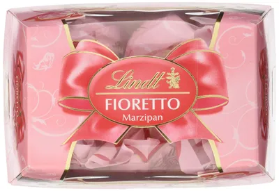 Produktbild von Lindt Fioretto Präsent Marzipan, raffiniertes Praliné mit Marzipan-Dessert-Füllung und feinen Mandelsplittern umhüllt von knusprigem Crisp und feiner Alpenmilch Chocolade, 138g