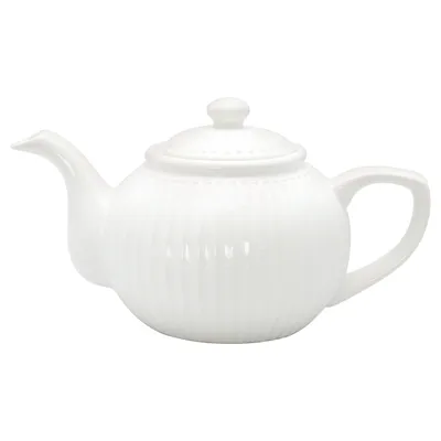 A white ceramic teapot with a lid, spout, and handle, set against a plain white background.