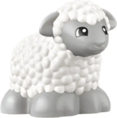 A toy sheep figurine.