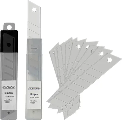 A collection of utility knife blades and their packaging.