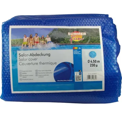 A folded blue solar pool cover in its packaging, with a picture of children in a pool on the label.