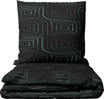 A folded duvet and pillow with a geometric pattern.