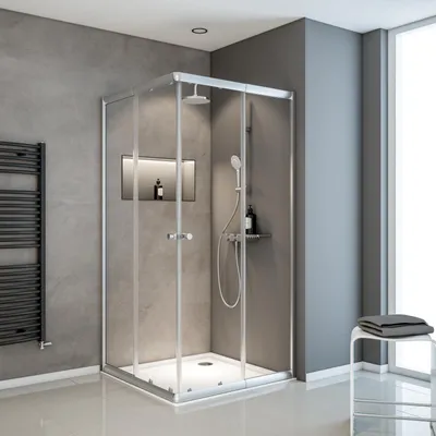 A modern bathroom with a glass shower enclosure.