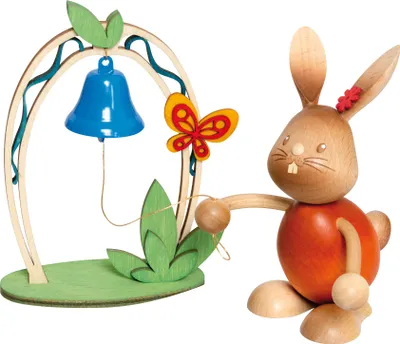 A wooden Easter decoration featuring a bunny and a bell.