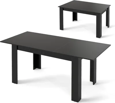 Two dark gray tables on a white background. One table is in the foreground and appears to be extended, while the other is in the background and appears to be in its smaller configuration.