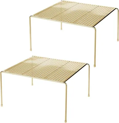 Two identical gold shelving units stacked on top of each other, shown against a white background.