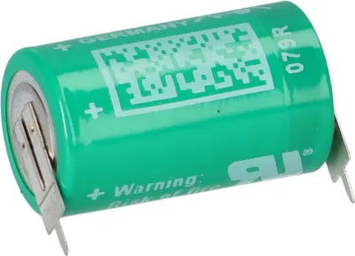 A close-up studio shot of a green Varta battery with silver metal contacts.