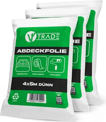 Three white plastic bags with green labels are stacked diagonally.