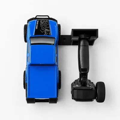 Produktbild von YUOM. Wandhalterung für Axial SCX24 mit Controllerhalter – RC-Auto Wandaufbewahrung – Schwarz