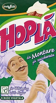 A chef holding a piping bag with cream, with the product packaging in the background.
