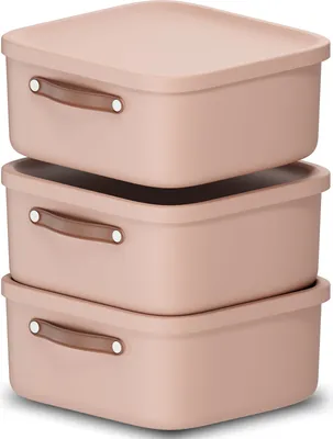Three pink storage boxes stacked on top of each other.