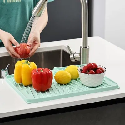 Zdjęcie produktu dla Elastyczna mata silikonowa Unyqoos®, szybko schnąca i antypoślizgowa, wolna od BPA, odporna na temperaturę do 220°C – idealna do naczyń i blatów kuchennych