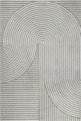A close-up view of a rug with a geometric pattern.