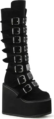 A single black boot with multiple buckles and a platform sole, shown against a white background.