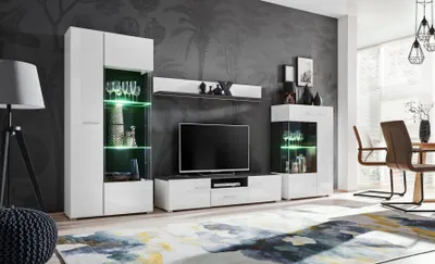 A modern living room with a TV unit, display cabinets, and a dining table.