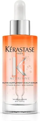A product shot of a Kérastase hair serum bottle.