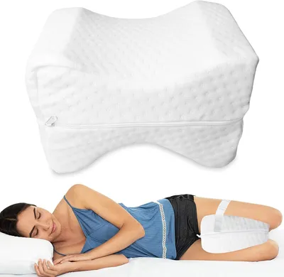 A pillow for the legs is shown both as a standalone product and in use by a person sleeping on their side.