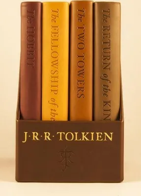 A set of four books by J.R.R. Tolkien, including 'The Hobbit' and 'The Lord of the Rings' trilogy, displayed in a brown slipcase.
