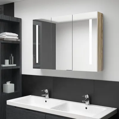 Produktbild von vidaXL LED-Bad-Spiegelschrank 89x14x62 cm Weiß und Eichen-Optik