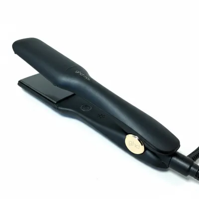 A black ghd Max Styler hair straightener is shown against a white background.
