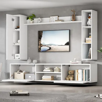 A white modular living room furniture set with a TV mounted on the wall.
