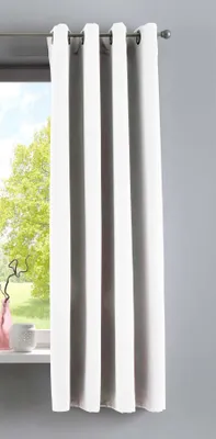 A white curtain hanging in front of a window.