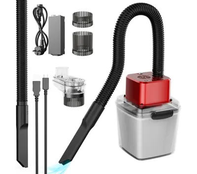 A collection of vacuum cleaner accessories and components laid out against a white background.