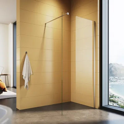 A modern bathroom with a glass shower wall and a large window overlooking a coastal city.