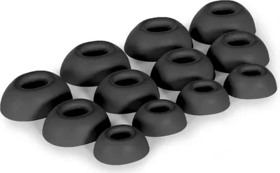 A collection of black silicone ear tips for headphones, arranged in rows on a white background.