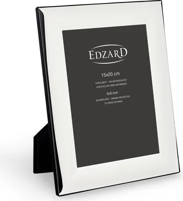 A silver-plated picture frame with a black stand is shown against a white background.