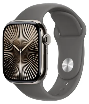 A close-up studio shot of an Apple Watch with a gray sport band and a gold and black patterned watch face.