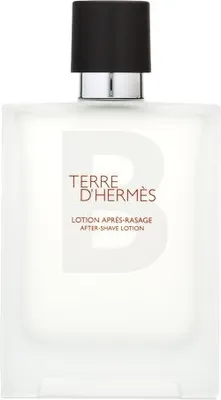 A product shot of a bottle of Hermes Terre D'Hermes after-shave lotion.