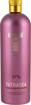 A bottle of Tatratea liqueur against a white background.