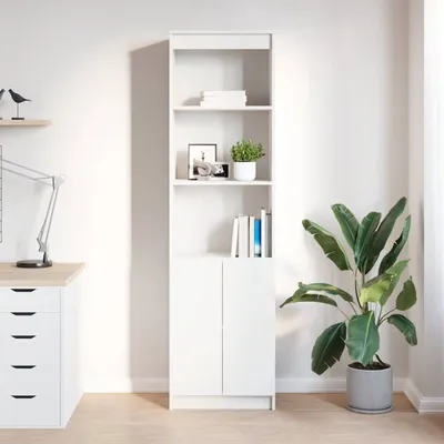 A white highboard is shown in a room with a desk and a plant.
