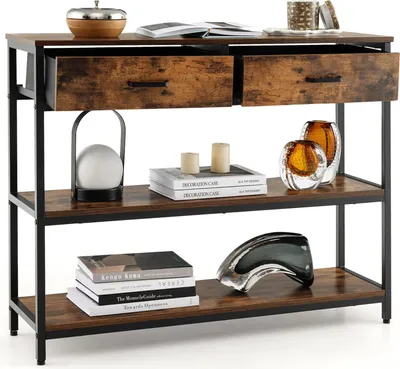 A console table with two drawers and two shelves, decorated with various items.