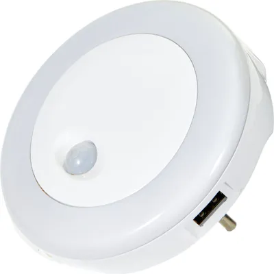 A white LED night light with a motion sensor and two USB charging ports.