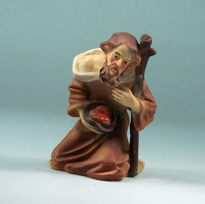 Produktbild von Schäfer kniend mit Brotkorb aus Polyresin. Zu 9 cm Krippenfiguren