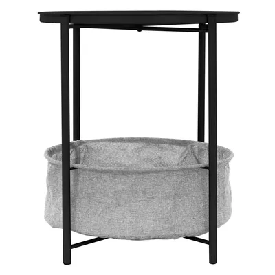 A black metal side table with a gray fabric basket underneath.