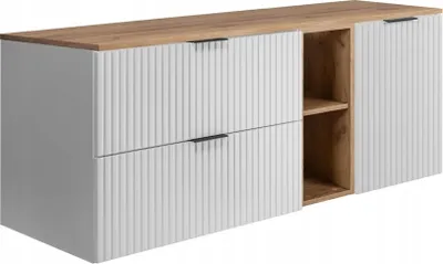 A modern white and wood bathroom cabinet with fluted doors and open shelving.
