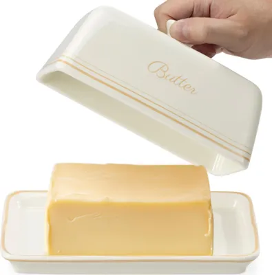 Produktbild von Navaris Butterdose aus Keramik - Steingut Butterglocke - 20,5 x 12,5 x 9,5 cm - klassische Butterschale creme weiß - Aufbewahrung für Butter