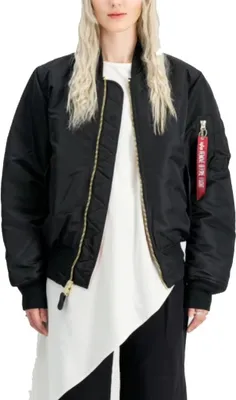 A person wearing a black bomber jacket over a white top.