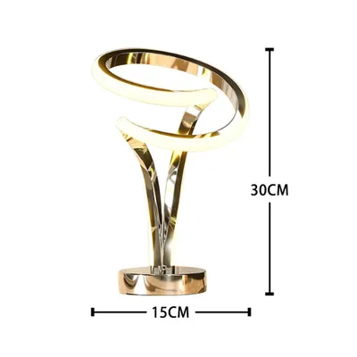 A modern, metallic table lamp with a spiral design and integrated LED lighting, shown against a white background with size indicators.