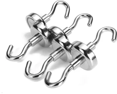 Three shiny metal magnetic hooks are arranged diagonally on a white background.