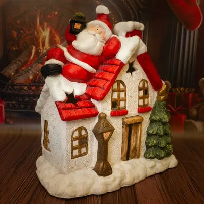 Zdjęcie produktu dla Figurka dekoracyjna Mikołaj na dachu domku 41 cm Solis Decor